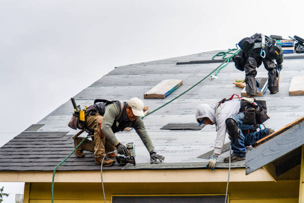 Professional Gutter Installation technician working in Oxford, KS